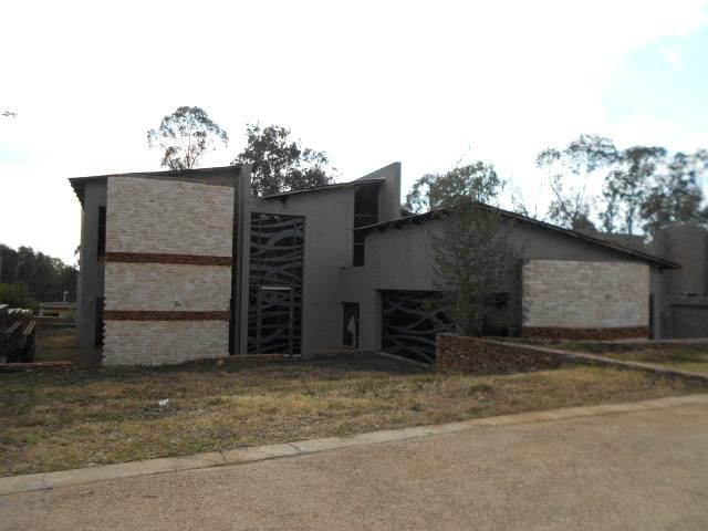 Double-storey face-brick home during construction